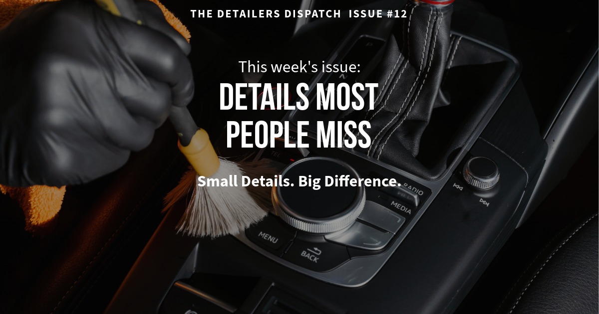 cleaning car interior with detailing brush