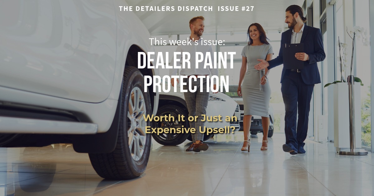 couple walking in new car dealership with salesman